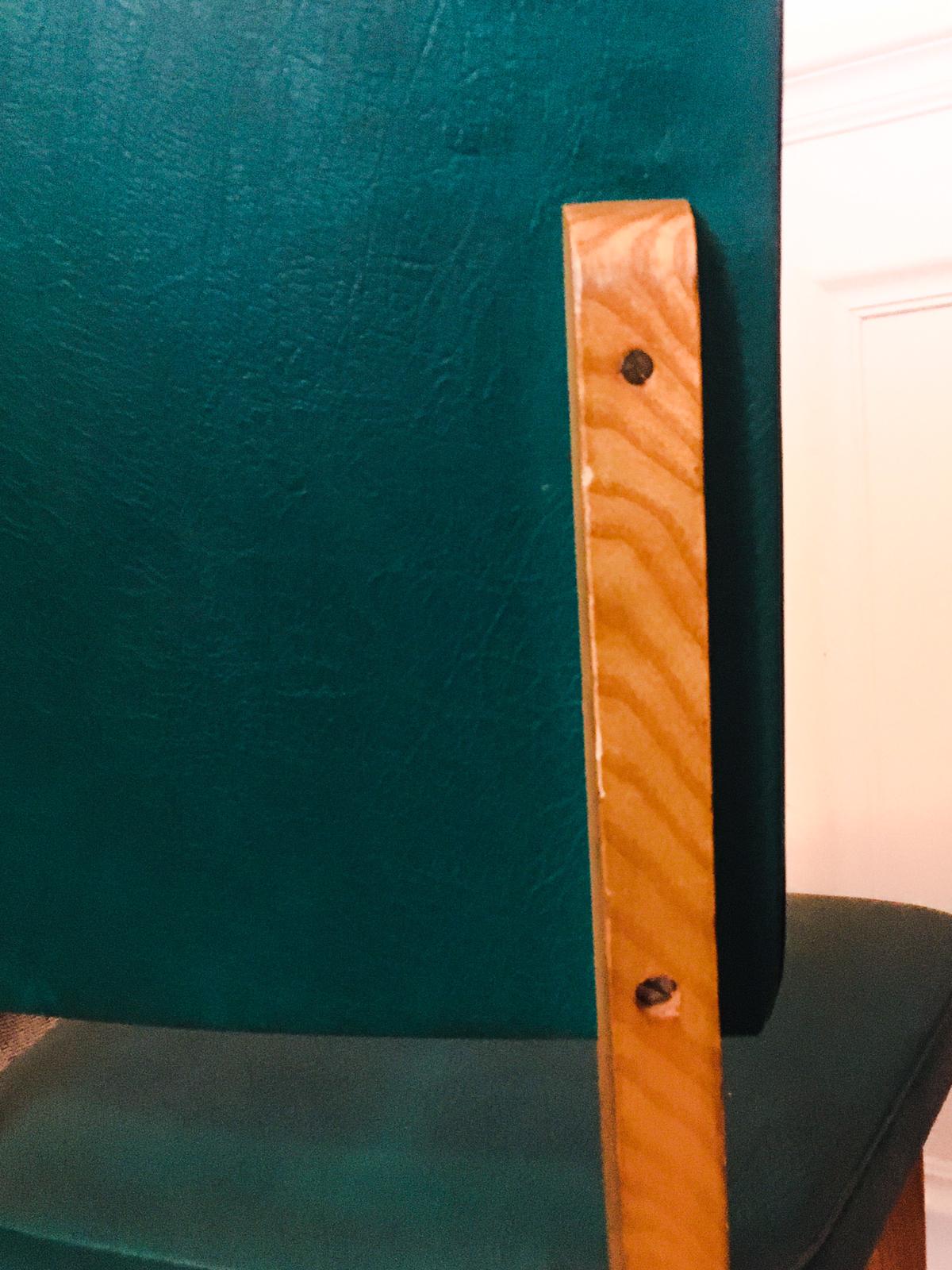 Two 1950s chairs made of wood and skai