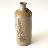 Leaf pattern stoneware bottle
