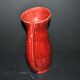 Sarreguemines wine jug in red slipware with grapevine decoration.