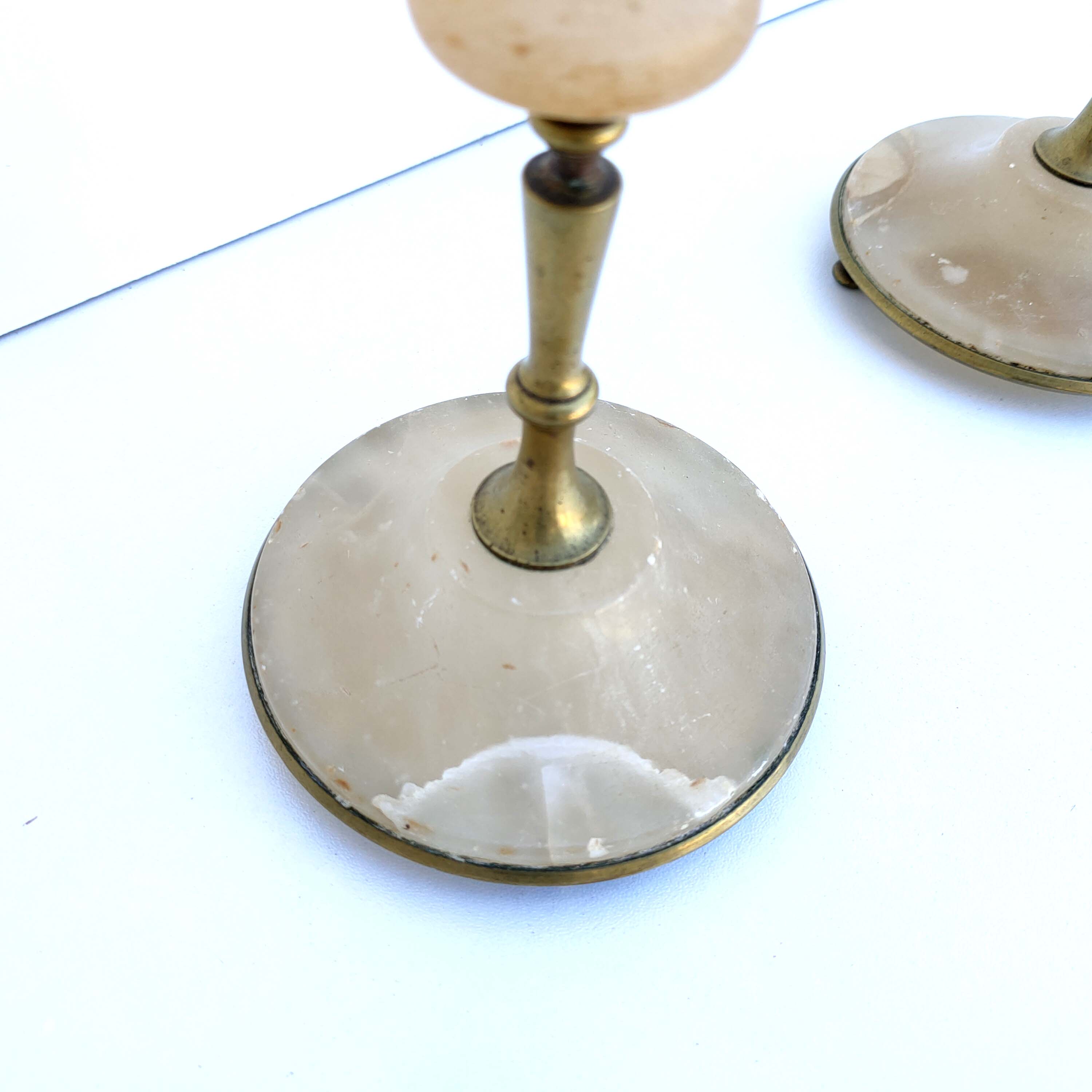 Pair brass and alabaster candlestick