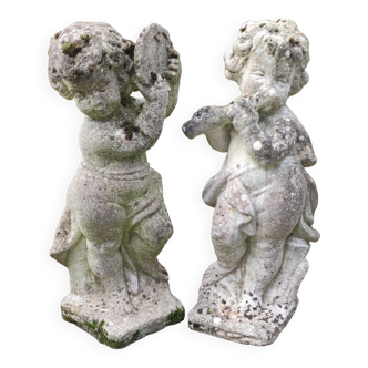 Pair cherub statues in reconstituted stone