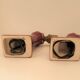 Pair of art deco sconces in bordeaux and gold ceramics