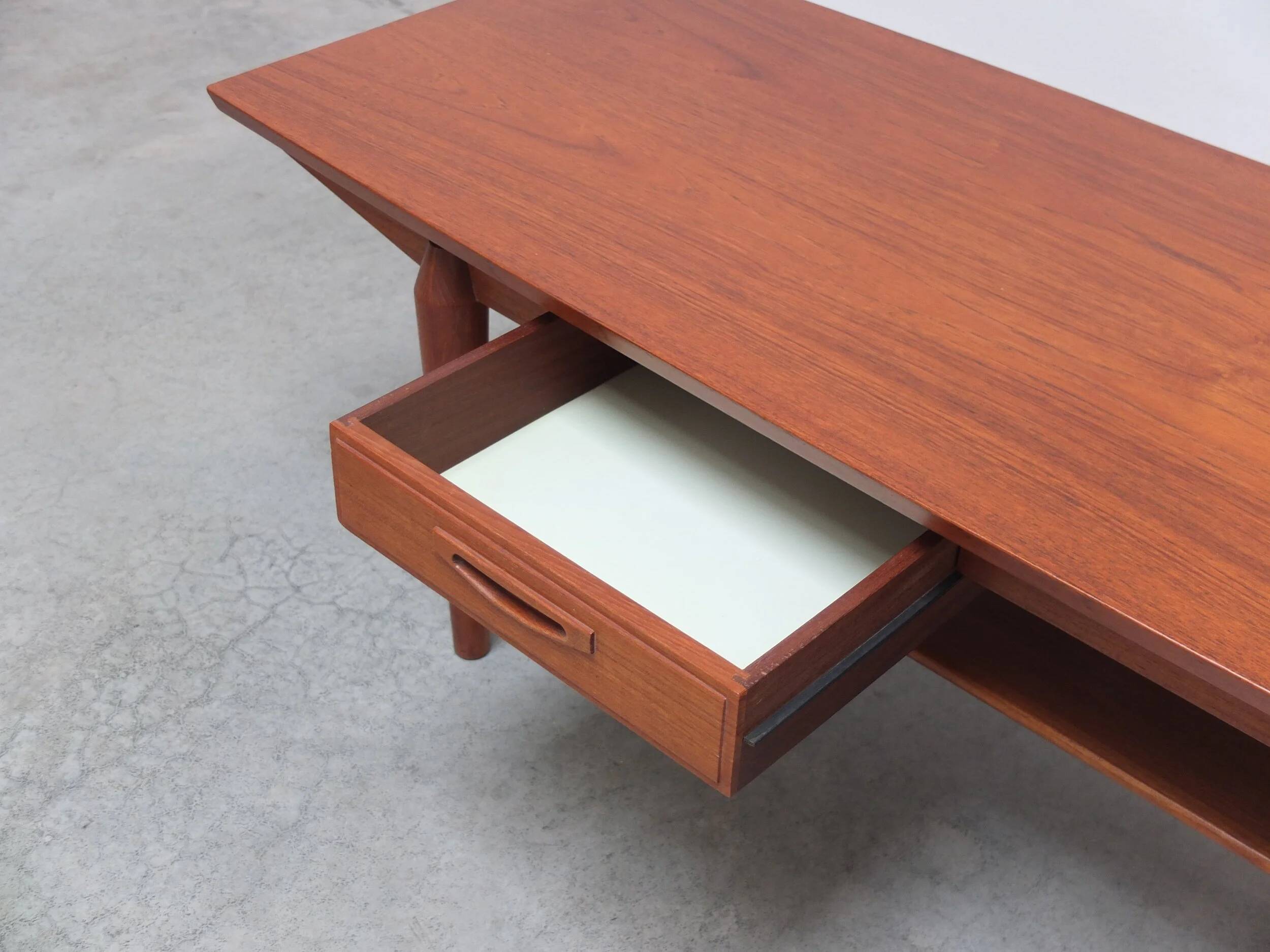 Large coffee table with magazine rack by O.M.F., 1960s