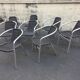Eight Roland Vlaemynck aluminum coffee terrace armchairs (stackable)