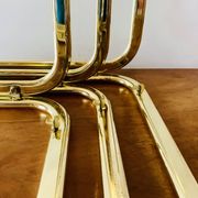 Vintage nesting tables in gold metal and smoked glass