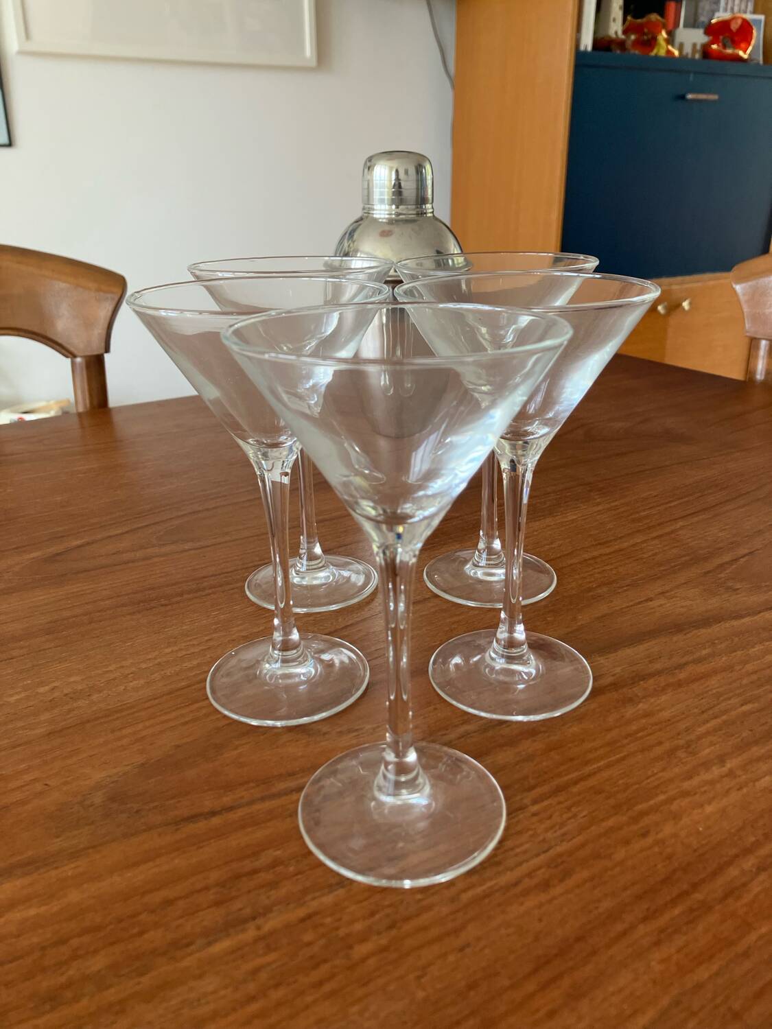 Shaker and five cocktail glasses