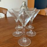 Shaker and five cocktail glasses