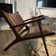 Armchair in wood and leather