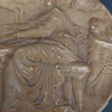 Tondo medallion in patinated plaster, woman and putti, late 19th century