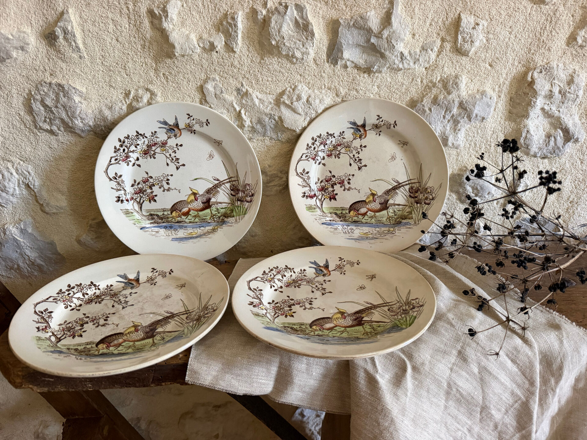 Polychrome ironstone dessert plates from Digoin and Sarreguemines.