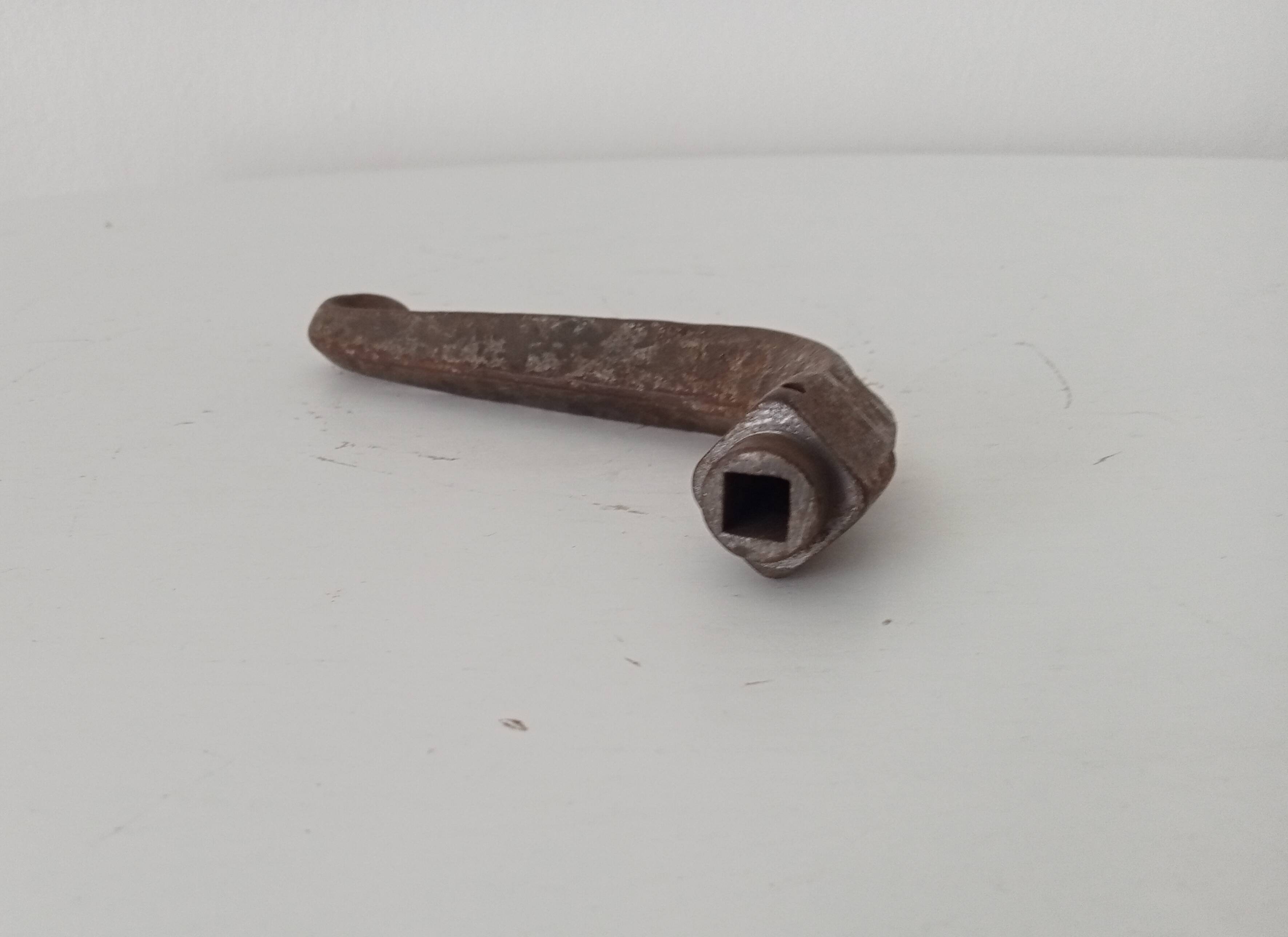 19th-century antique door handle in forged steel