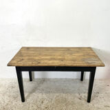 Varnished farmhouse table and blackened wood