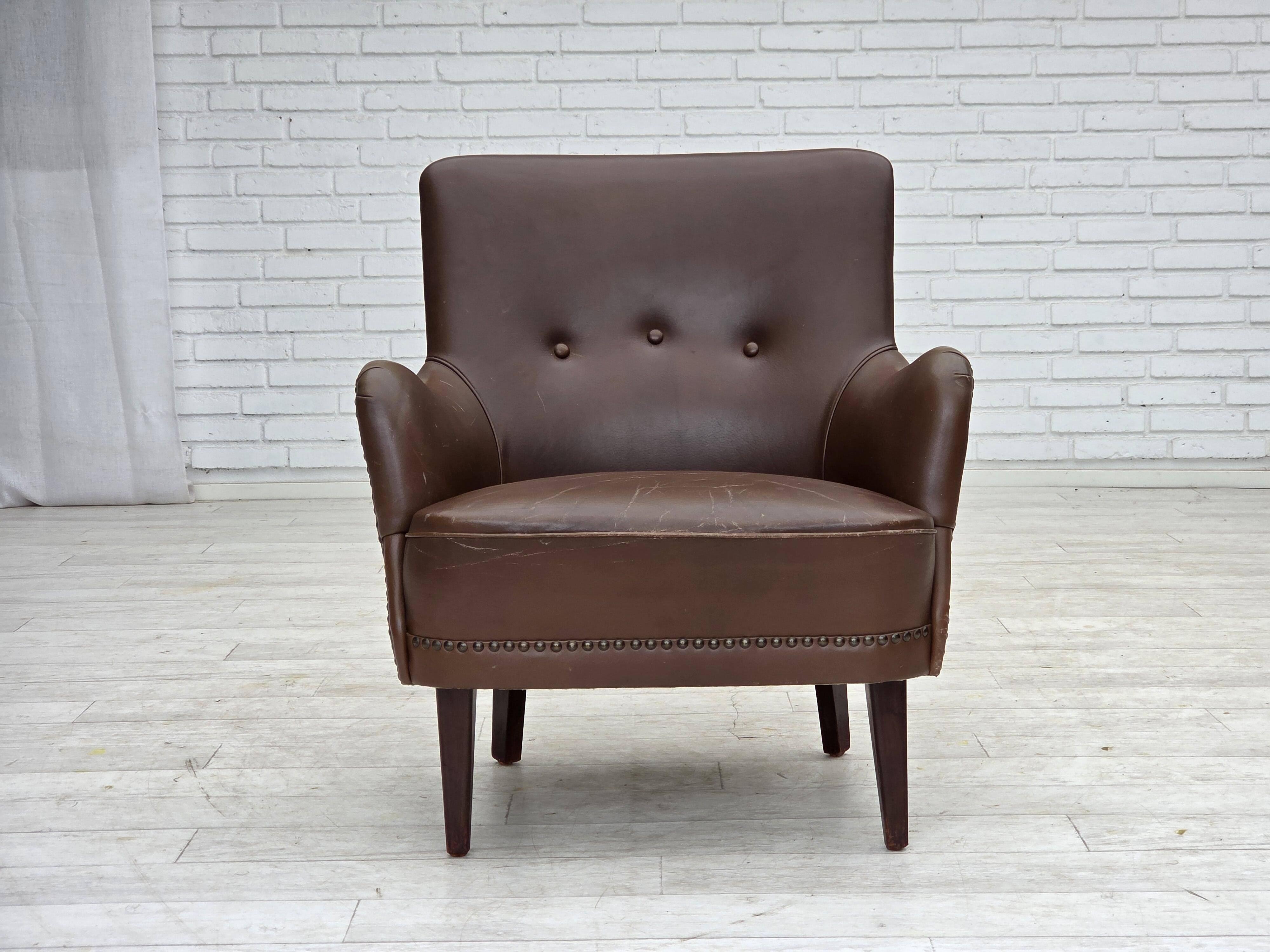 1960s, Danish armchair, furniture leather, ash wood legs.