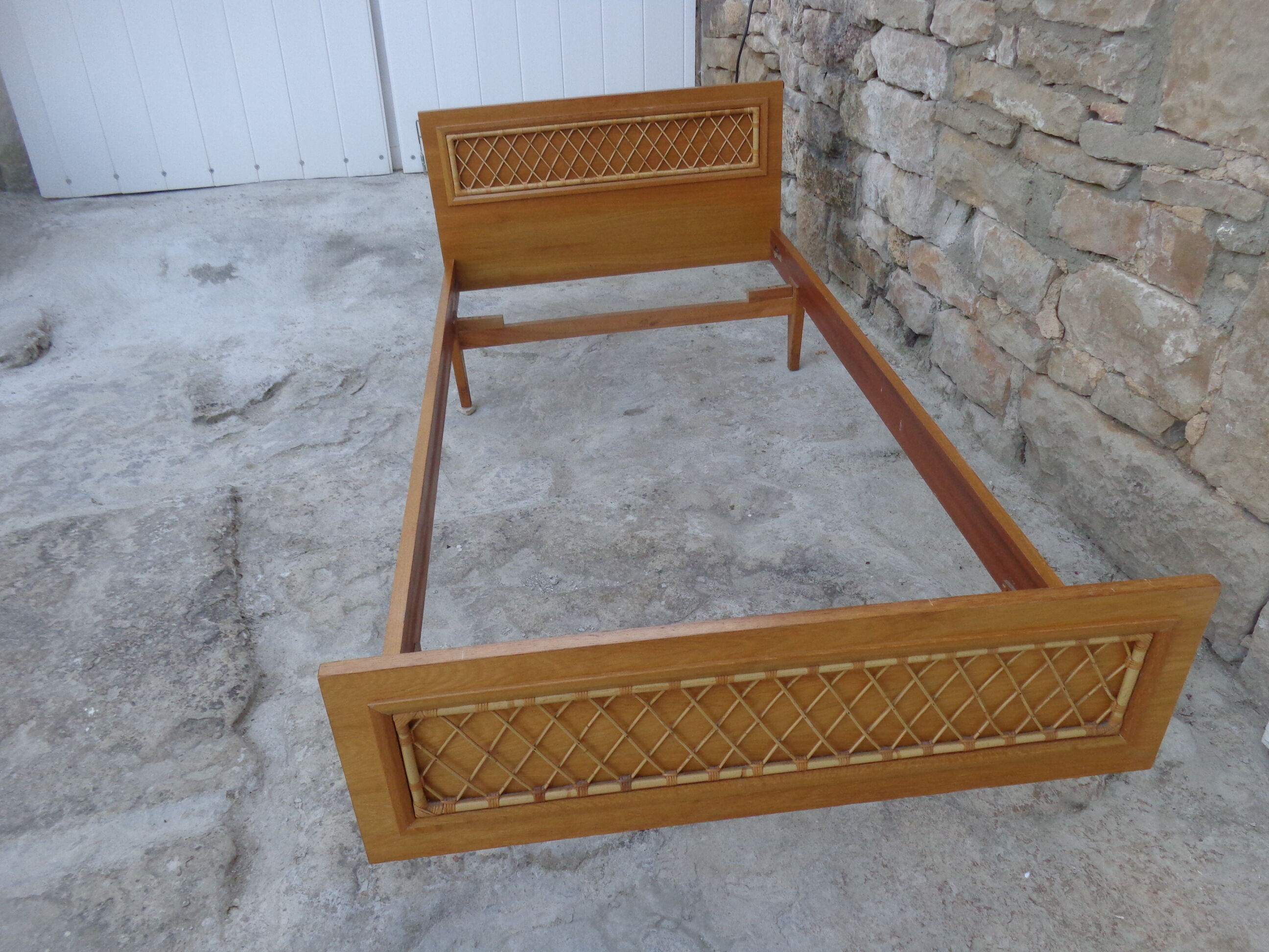 Bed wood and rattan wineing Louis Sognot of the 50s with his articulated box spring