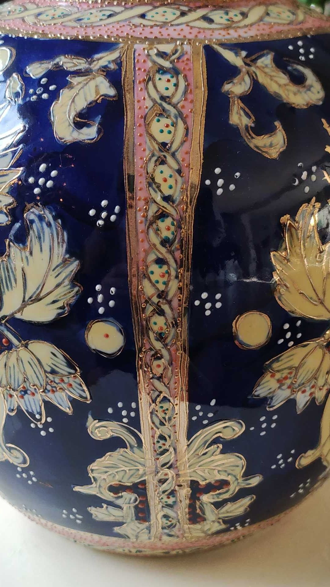 Handcrafted Chinese vase shaped ball in enamelled ceramic. Floral motifs/Ribboned friezes