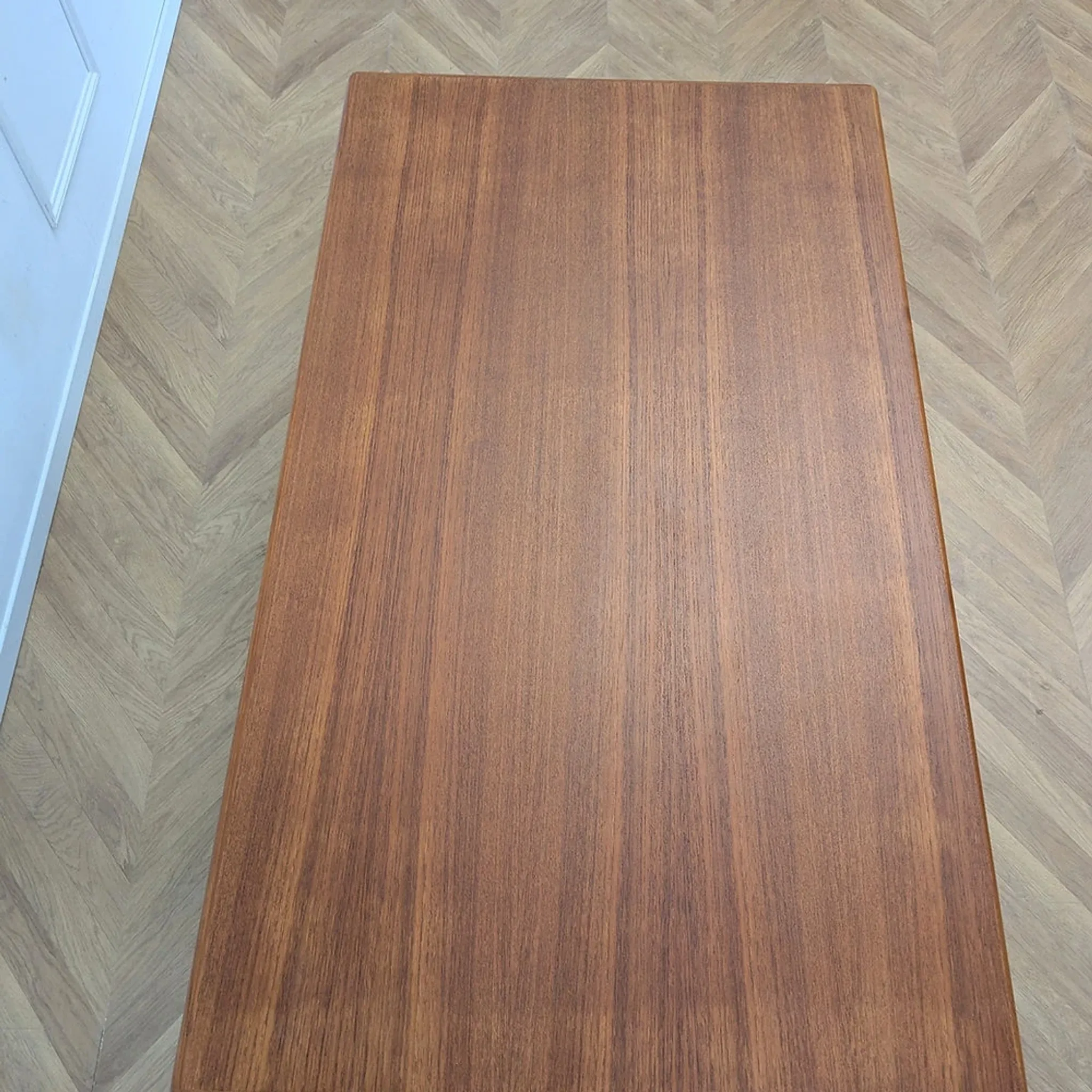 Scandinavian teak dining table with extensions