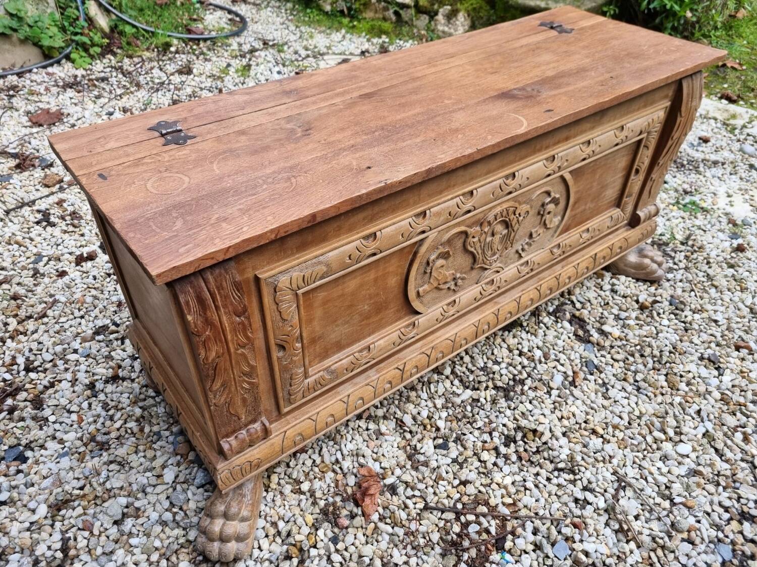 Wooden chest with lion paws