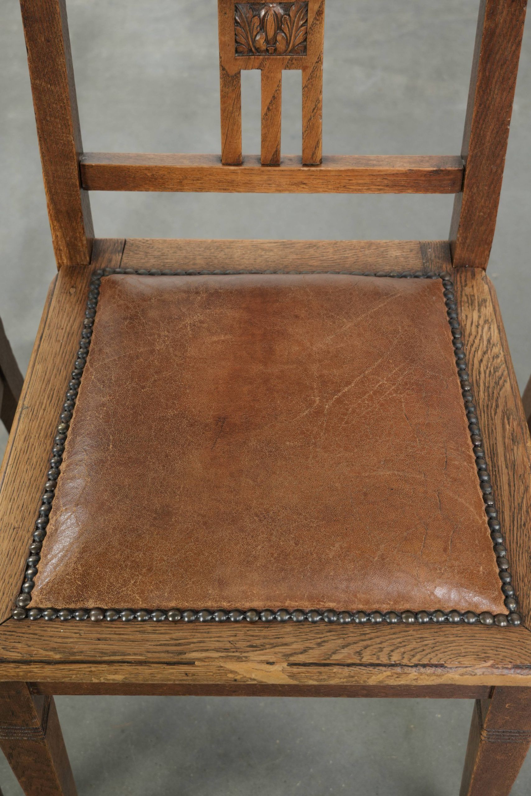 Set of 4 antique oak dining chairs in Art Nouveau style with sheepskin