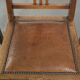 Set of 4 antique oak dining chairs in Art Nouveau style with sheepskin