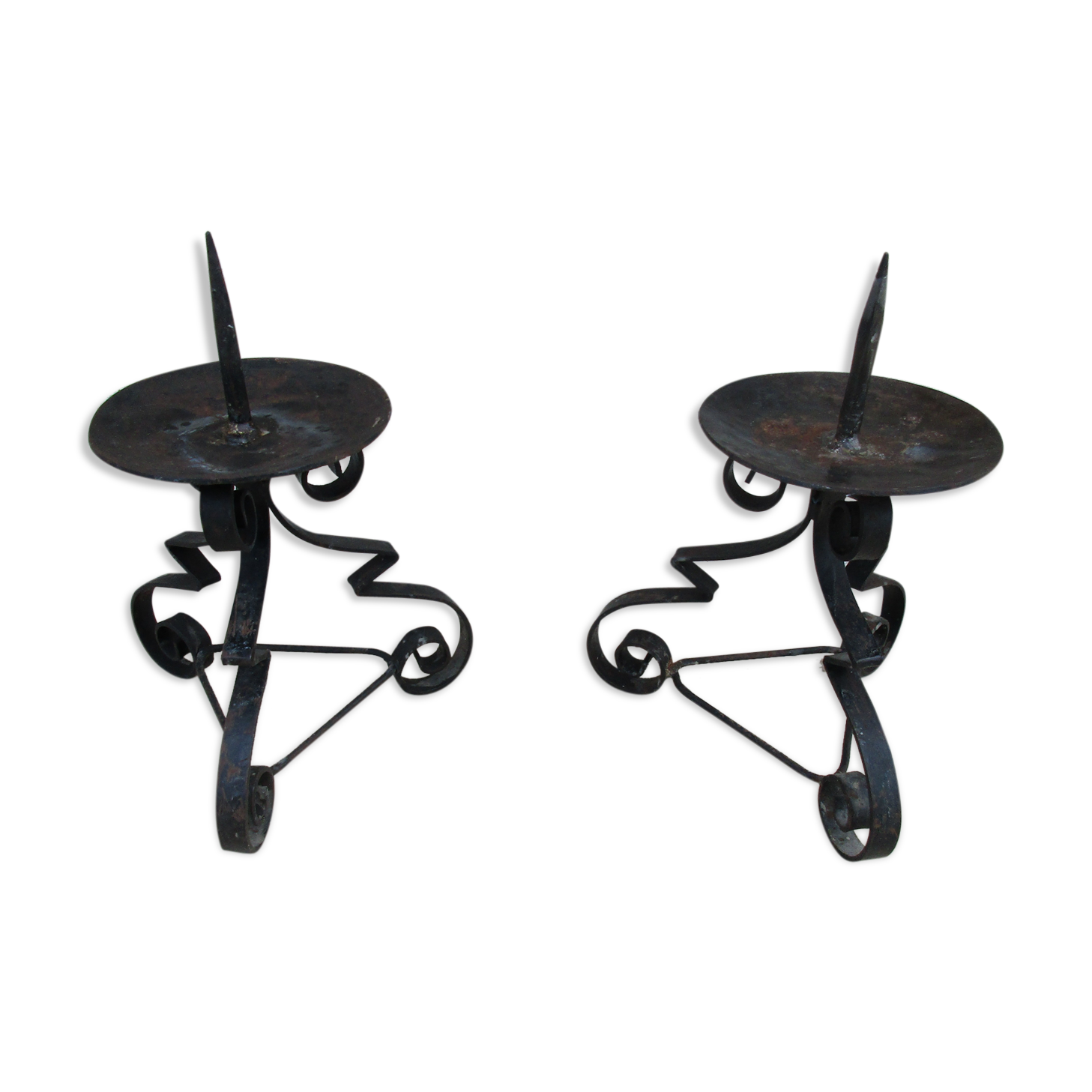 Pair of iron candlesticks