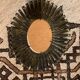 Golden iron star-shaped mirror, mid-1900s.
