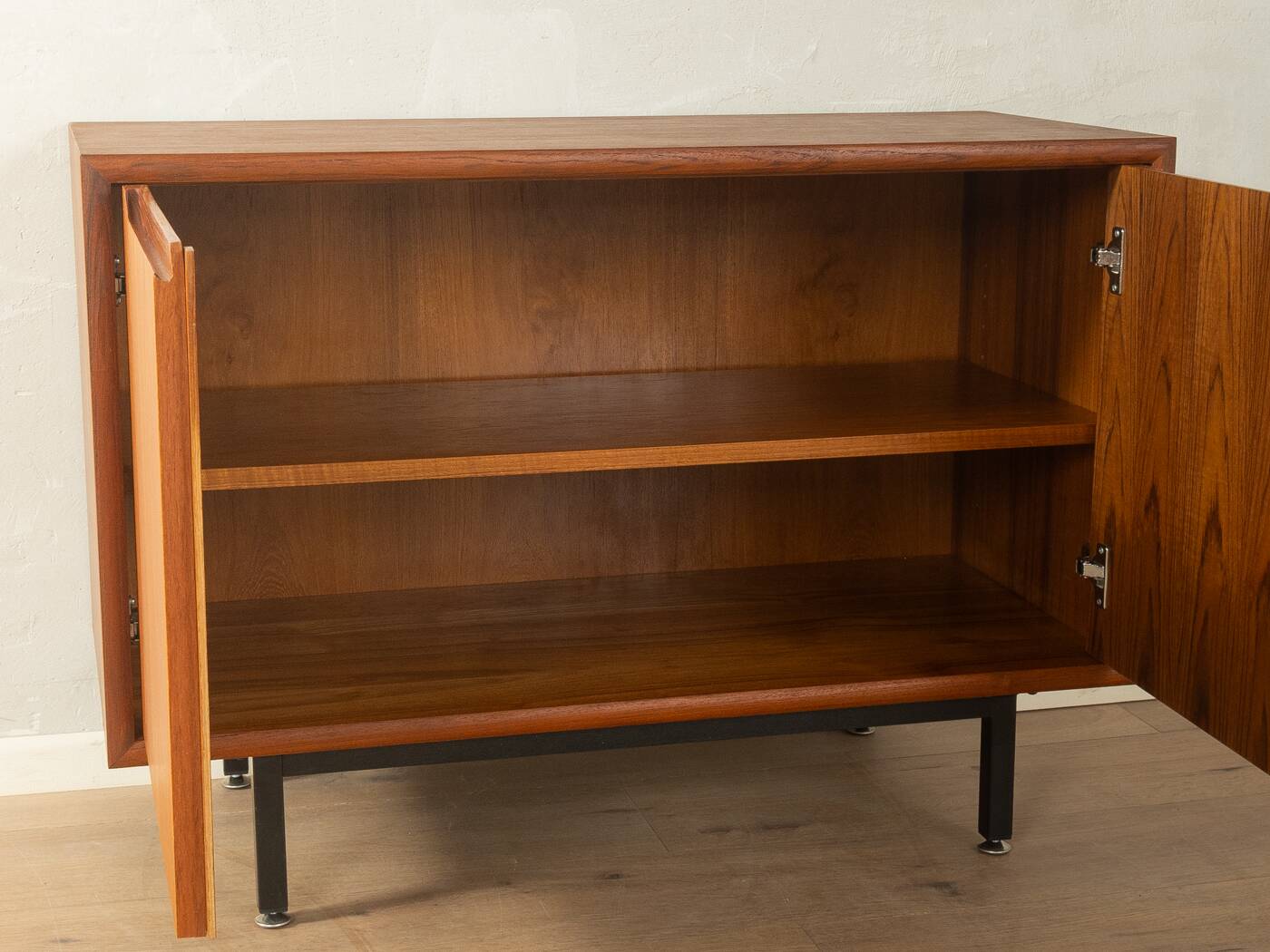 Classic chest of drawers from the 1960s with practical, closed storage space