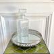 Openwork metal round mirror top