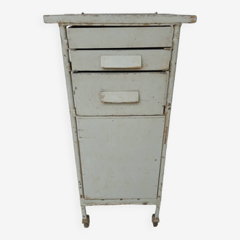 Old workshop trolley with three drawers and a door