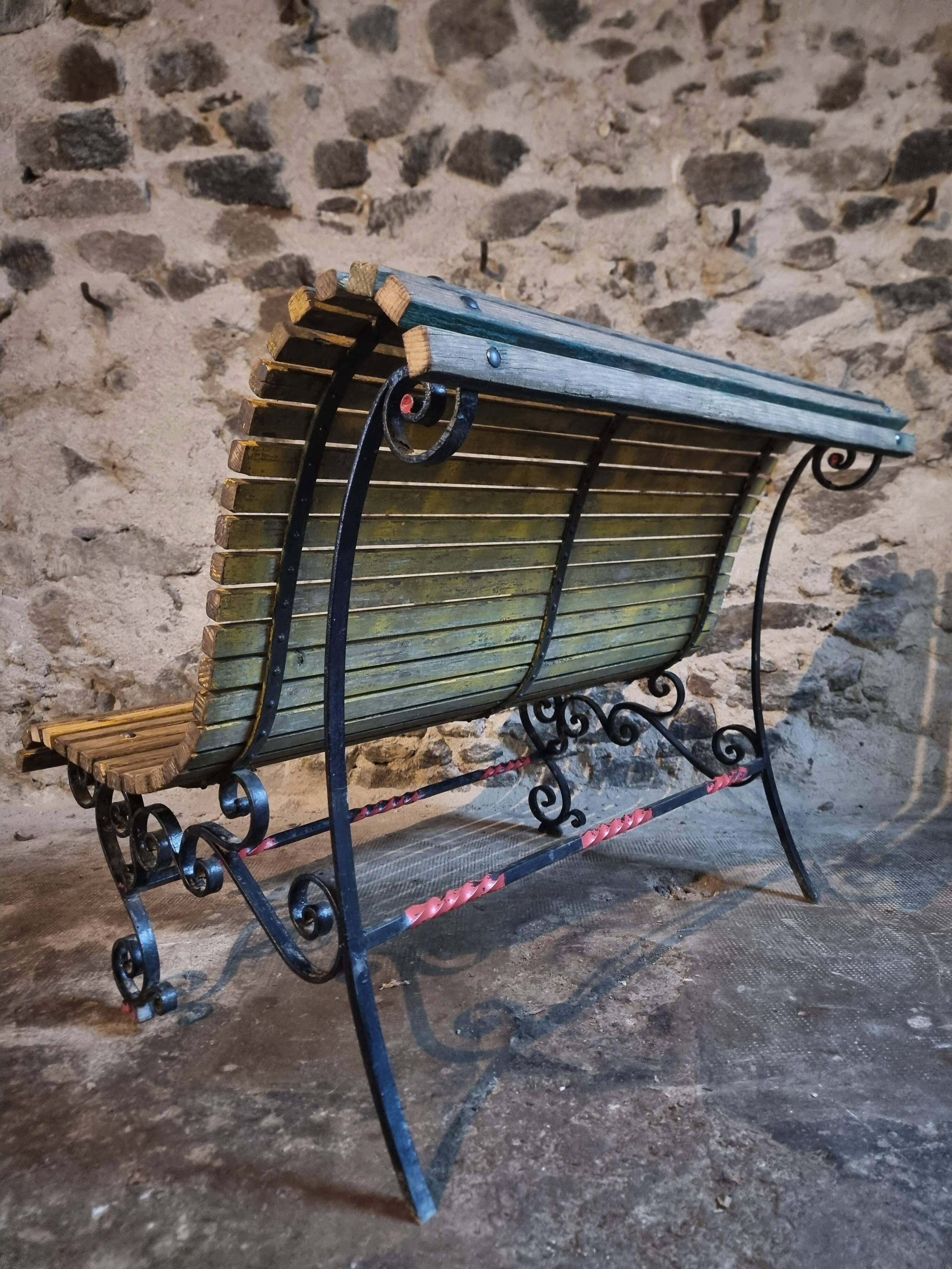 French garden bench in iron and wooden slats, mid-20th century.