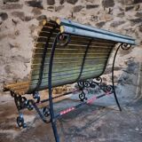 French garden bench in iron and wooden slats, mid-20th century.
