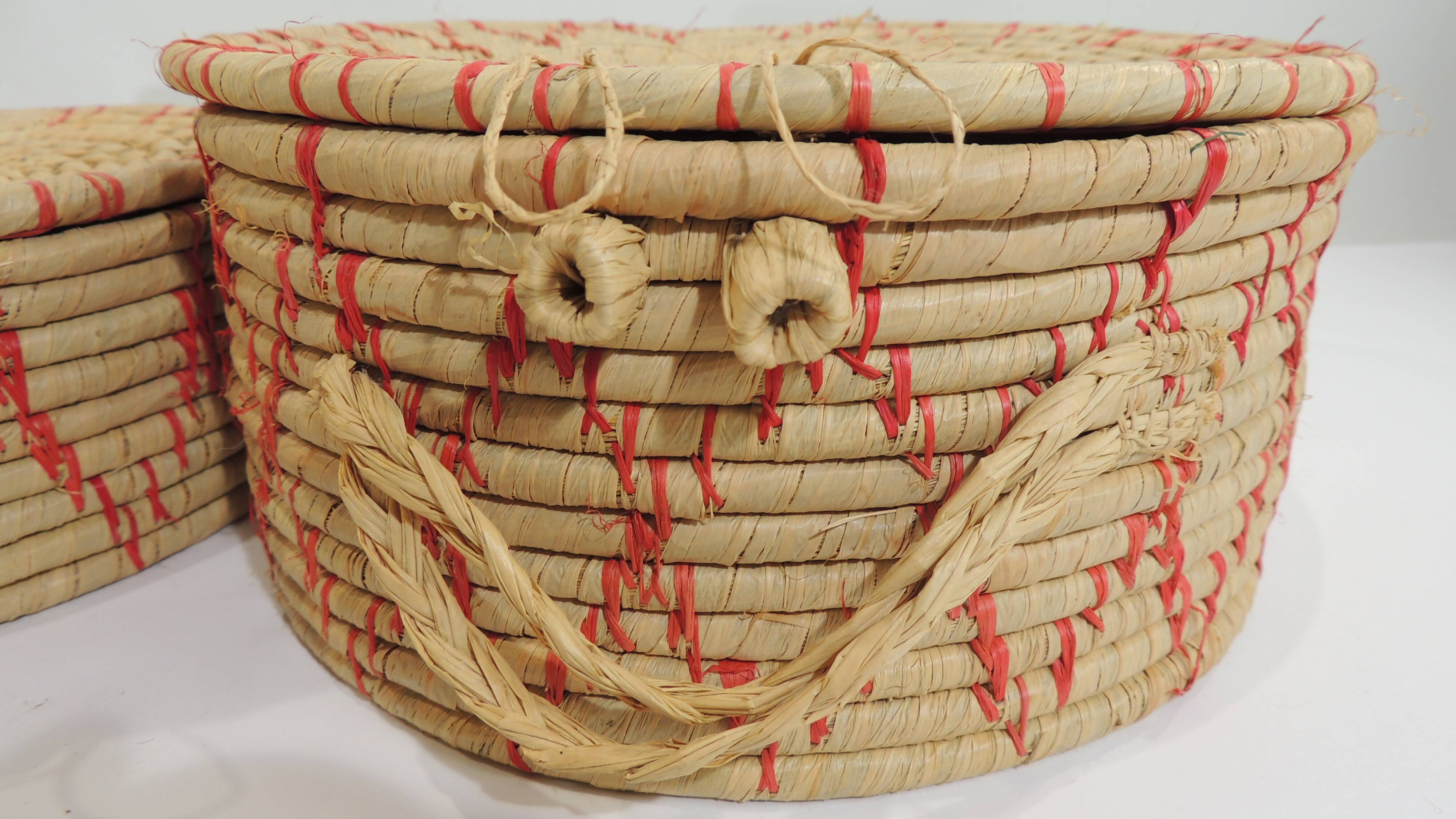 Set of three african raffia basket