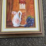 Still life with jam jar, flowered jug and grapes – Signed oil