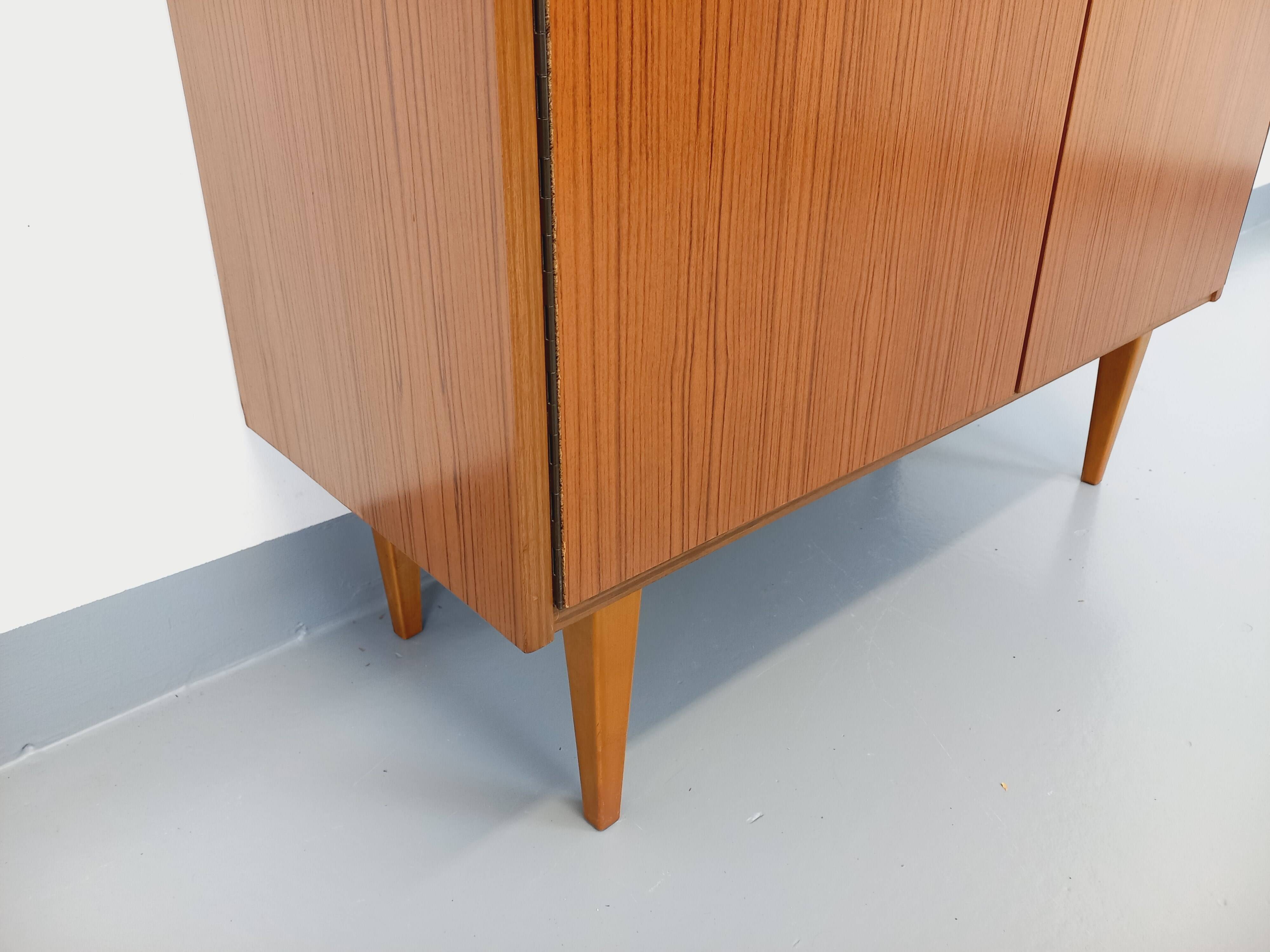 Vintage Scandinavian style storage bookcase in melamine and teak from the 60s