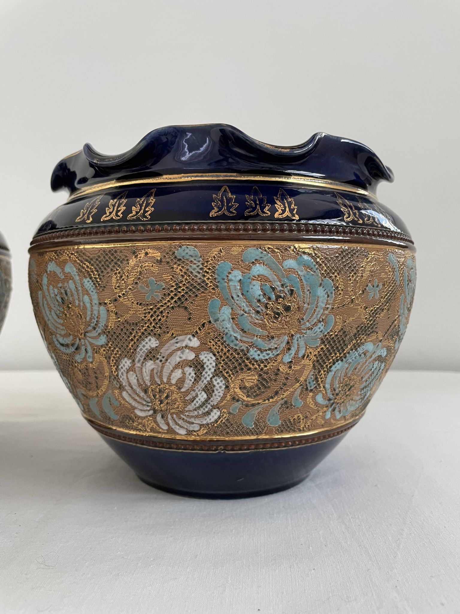 Pair, cache pots, royal doulton, english earthenware, 1920-1930, floral decoration, blue and gold, marks in