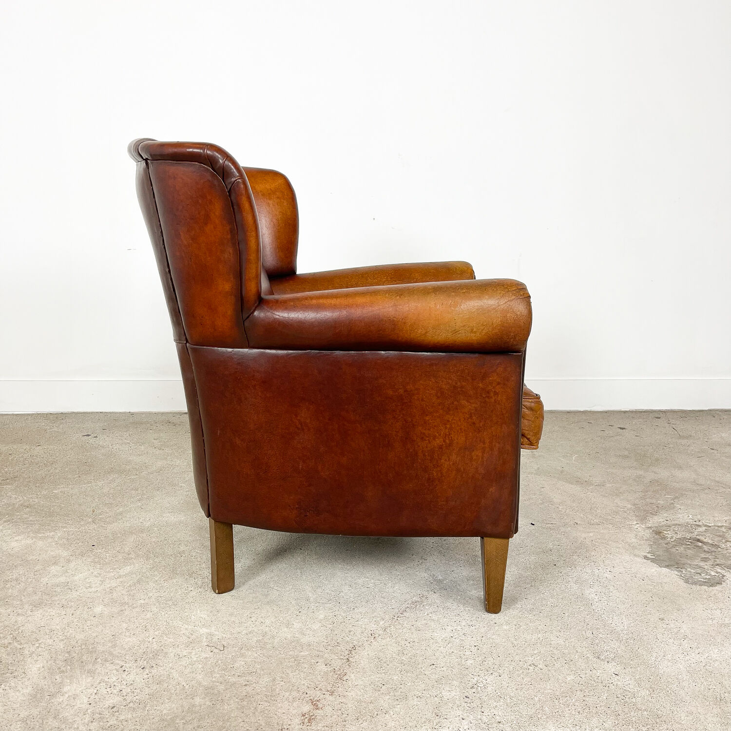 Vintage sheep leather wingback armchair zuna
