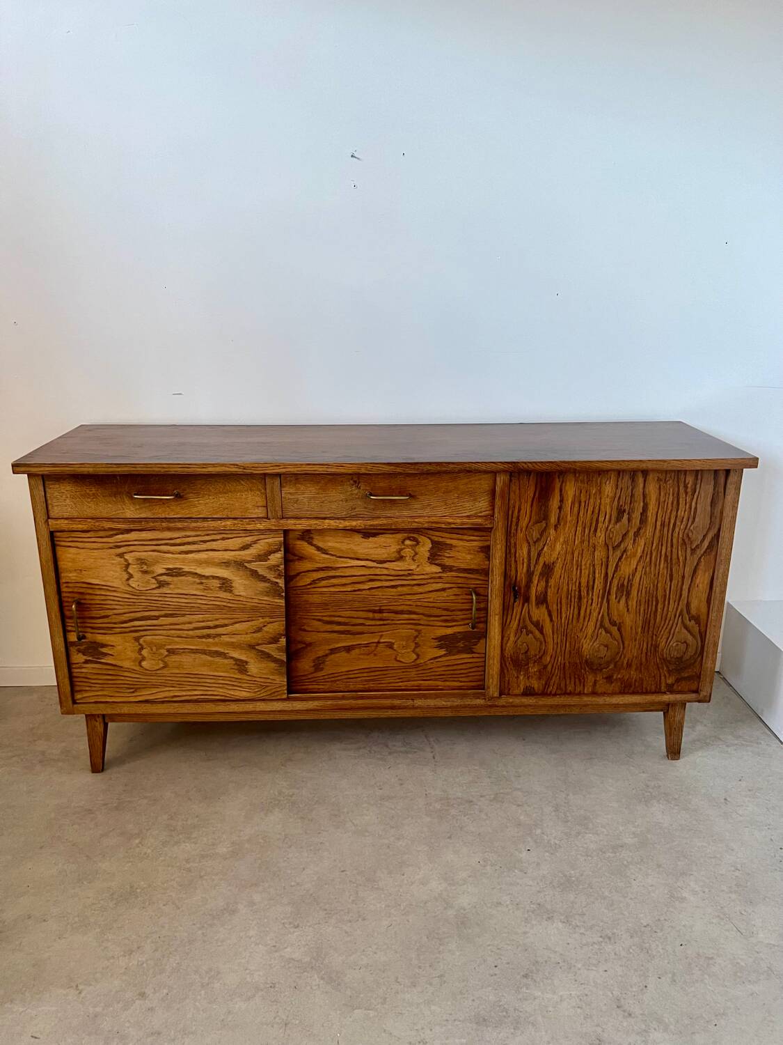 Old oak sideboard from the 1950s, vintage reconstruction period