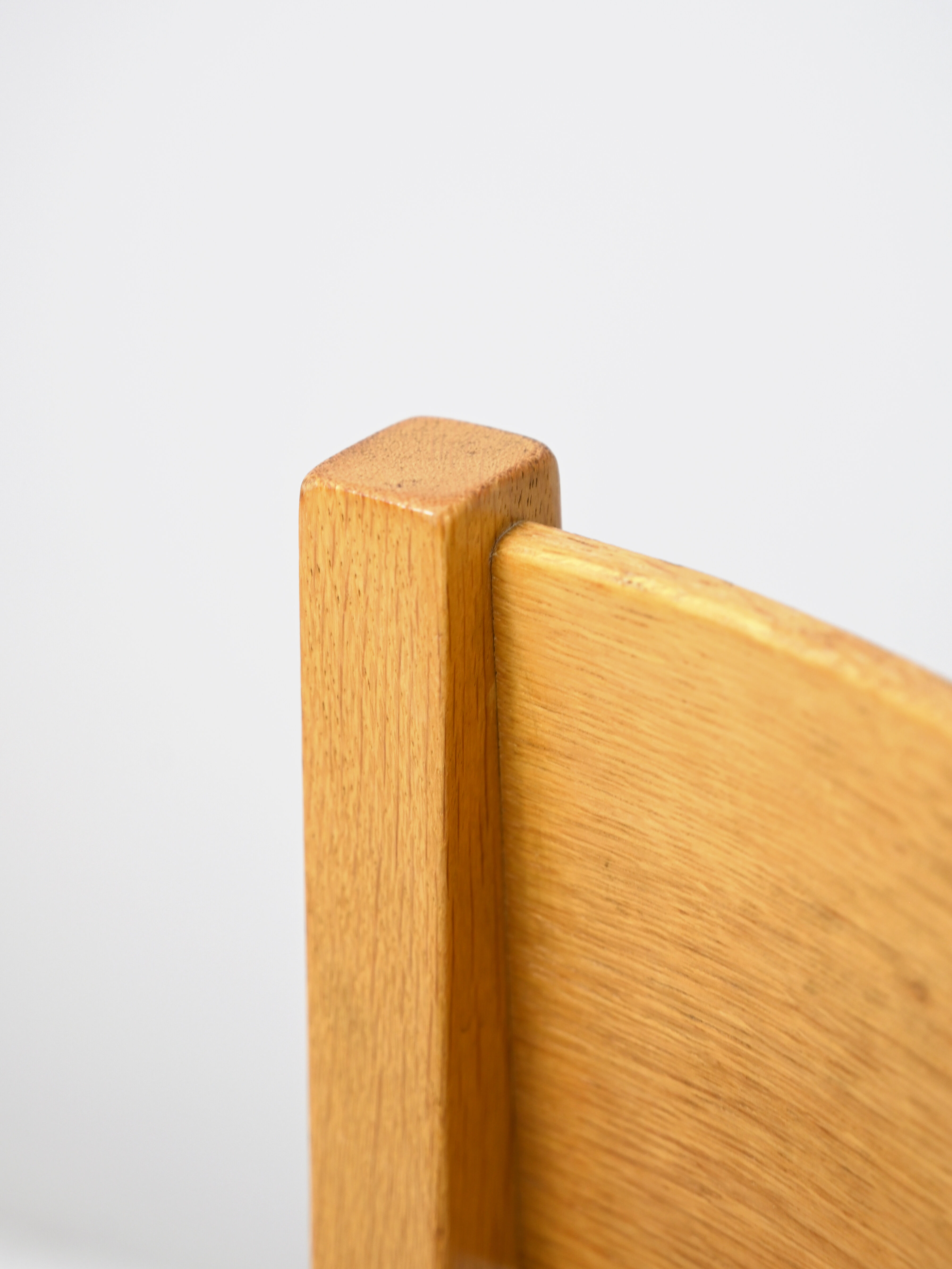 Wooden chair with armrests