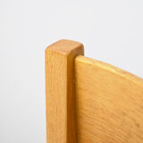 Wooden chair with armrests