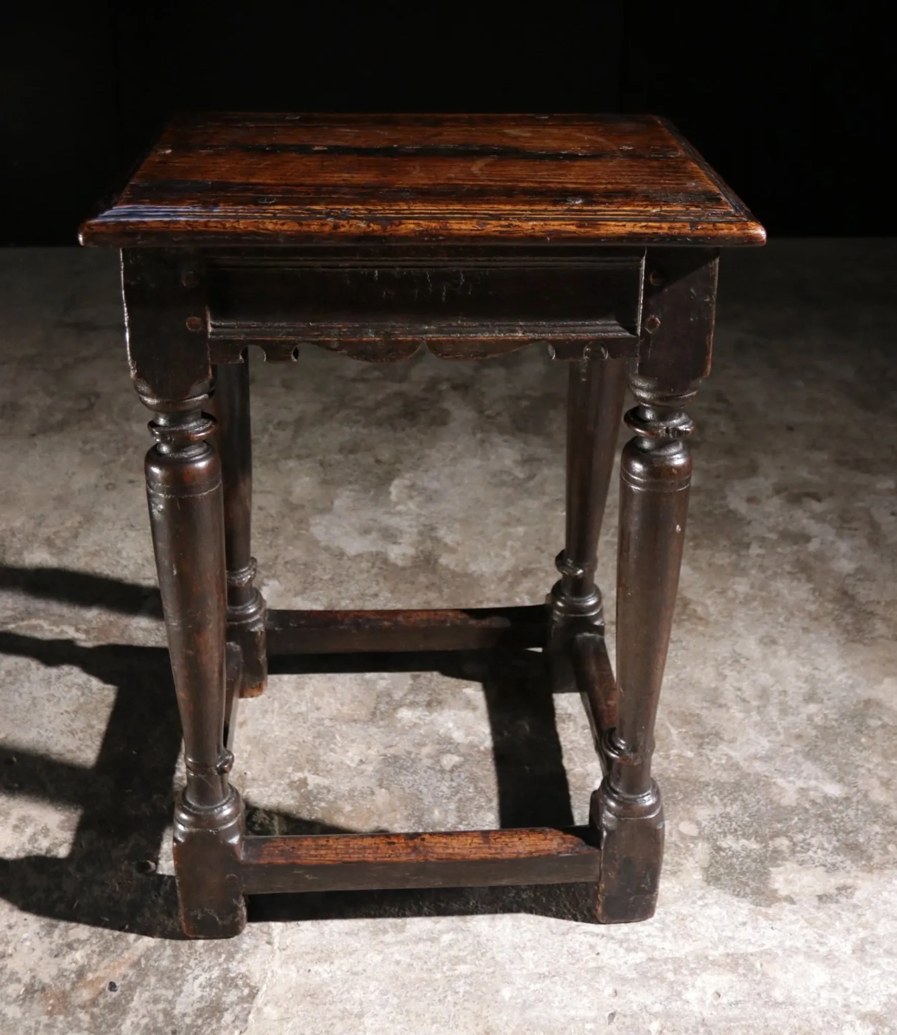 17th-century English oak joint stool with turned legs