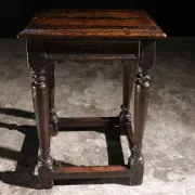 17th-century English oak joint stool with turned legs