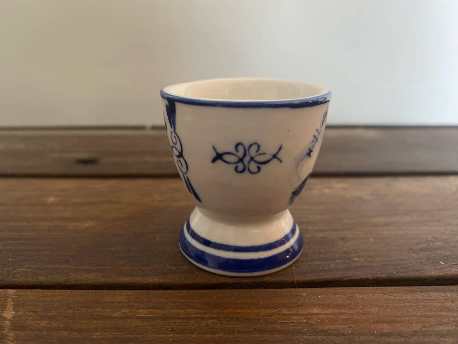 Set of 4 antique delft egg cups, white ceramic with blue vinta decor