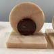Pair of art deco pink marble bookends