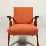 Vintage orange curly armchair Scandinavian design 1970