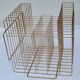 Vintage "wire" magazine rack in gold metal