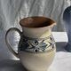 Vintage white pitcher with stylized blue plant frieze H17.5