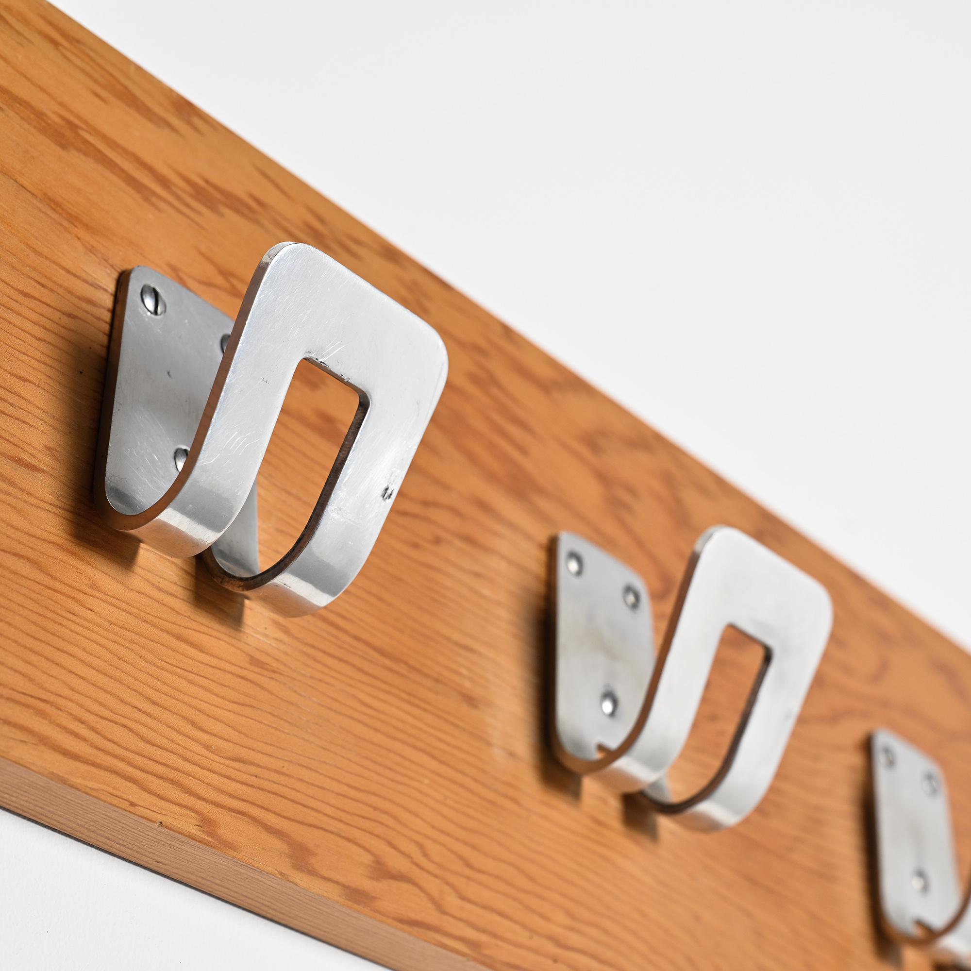 Wall coat rack by Pierre Guariche for La Plagne, around 1968.
