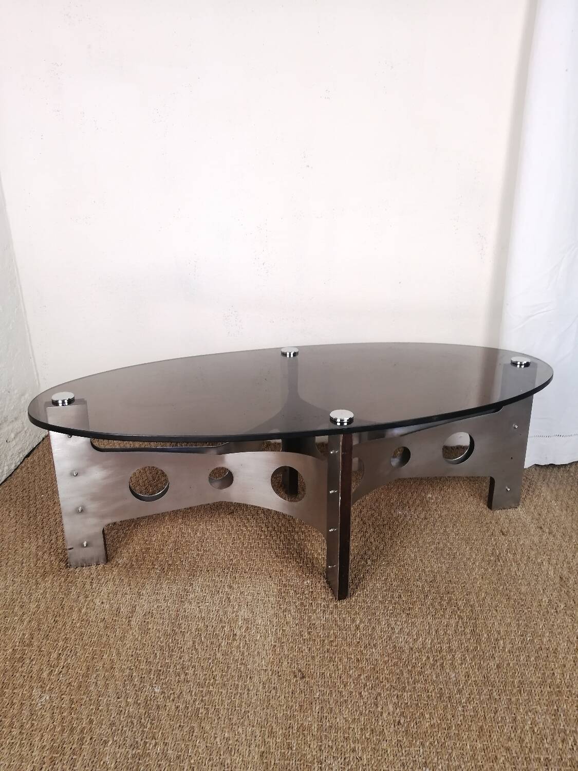 Vintage design coffee table in brushed aluminum and glass top.
