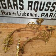 Set of two large antique brass candle wall sconces.