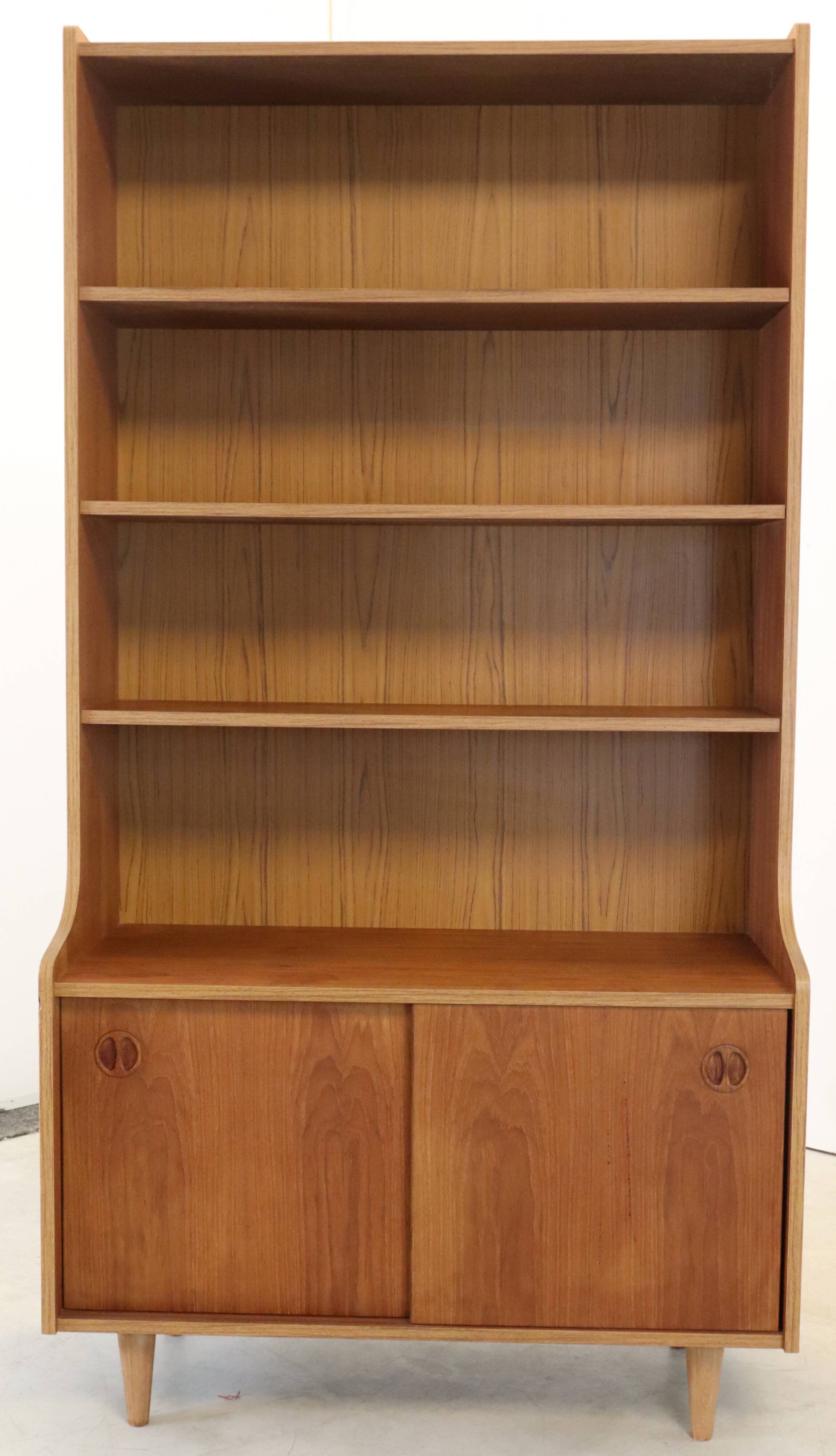 vintage bookcase with full on storage space.