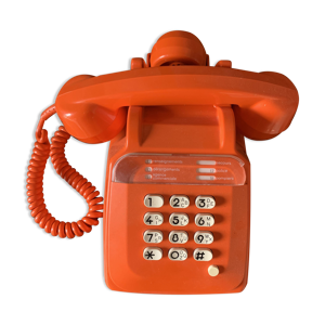 Téléphone vintage orange à touches